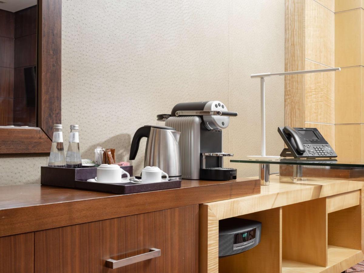 Hotel The Venue Jeddah Corniche Exterior foto A Nespresso machine in a hotel room